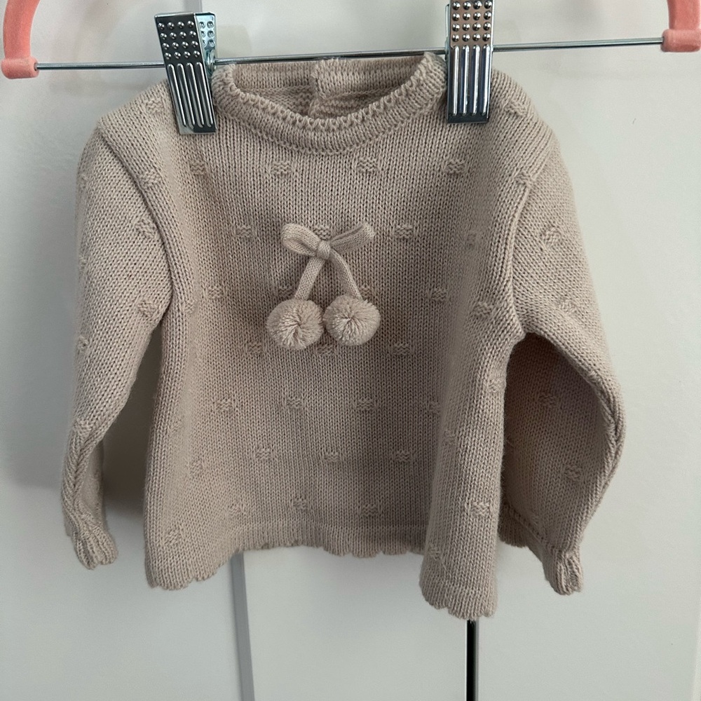 Adorable Tan Knit Sweater with Pom Poms